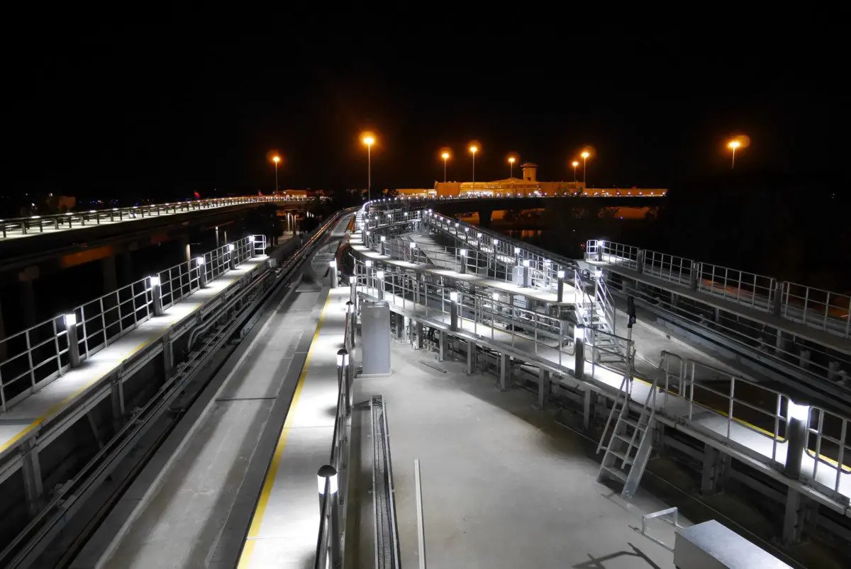 Access Fixtures Dome Top Bollard Lights  with Aluminum Cone Reflectors Illuminate the Emergency Egress for the Light Rail System at  Orlando International Airport